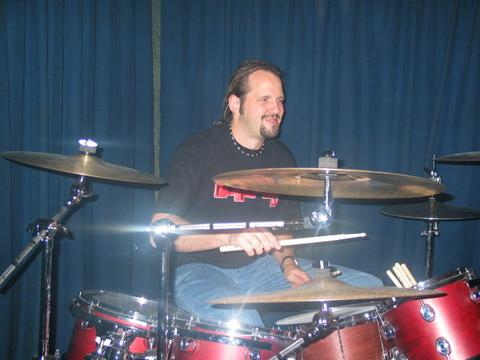 Tommy playing "No Regrets" with Racer